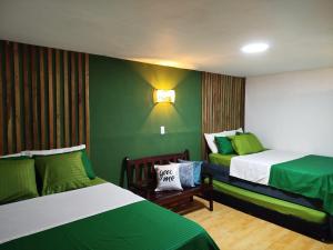 Postel nebo postele na pokoji v ubytování HOSTAL LA BOQUILLA