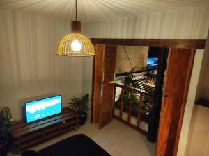 TV a/nebo společenská místnost v ubytování HOSTAL LA BOQUILLA
