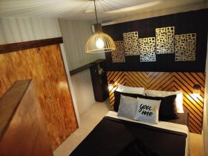 Postel nebo postele na pokoji v ubytování HOSTAL LA BOQUILLA