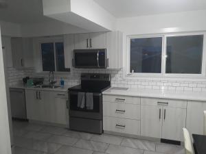 Kuchyň nebo kuchyňský kout v ubytování House B + 4 fotografie