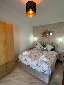 Postel nebo postele na pokoji v ubytování AnfaSuites - Le Central - Parking Free - CasaPort 5min