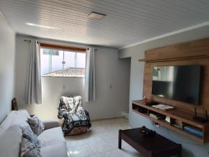 Μια τηλεόραση ή/και κέντρο ψυχαγωγίας στο Casa José Gonçalves Buzios