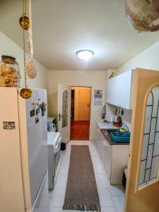 Cucina o angolo cottura di JO.RA. APARTMENT