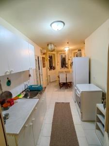 Cucina o angolo cottura di JO.RA. APARTMENT
