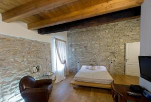 TV a/nebo společenská místnost v ubytování Relais Il Presidio