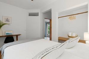 Postel nebo postele na pokoji v ubytování Villas Vibras