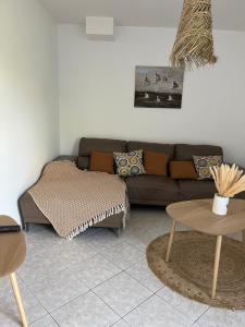 Χώρος καθιστικού στο Maison BELMIRA