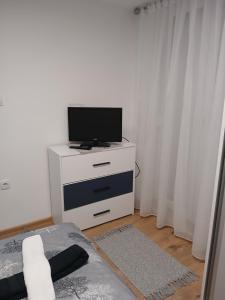 TV o dispositivi per l'intrattenimento presso HOLIDDAY HOUSE THE LUx