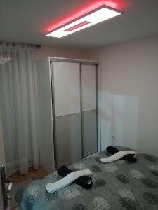 Letto o letti in una camera di HOLIDDAY HOUSE THE LUx