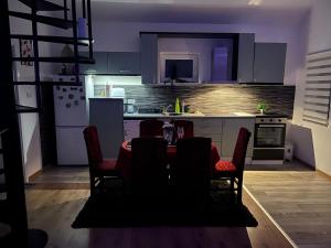 Cucina o angolo cottura di HOLIDDAY HOUSE THE LUx