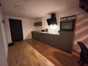 Kuchyň nebo kuchyňský kout v ubytování Loft19 + 3 fotografie