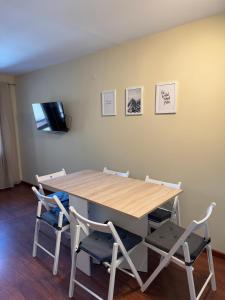 TV a/nebo společenská místnost v ubytování Céntrico apartamento con vistas en Formigal - Entrada 24h sin llaves