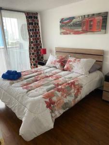 Postel nebo postele na pokoji v ubytování Cómodo departamento a solo 2 cuadras de Playa Cavancha