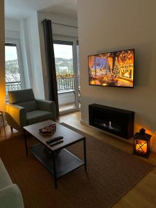 تلفاز و/أو أجهزة ترفيهية في The Nest Apartment