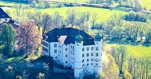 an aerial view of a castle in a field at Ferienwohnung zum Sepp in Mühlheim an der Donau