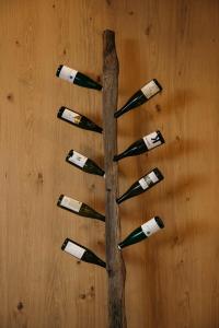 a group of wine bottles forming a tree at Boutique Hotel Pachers in Bressanone