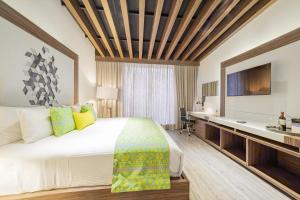 Uma cama ou camas num quarto em Flow Condesa - Adults Only