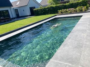 Bazén v ubytování Accommodatie voor bezoek DTRH 2-4 personen nebo v jeho okolí