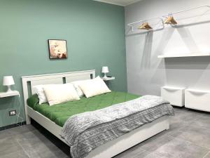 Letto o letti in una camera di Siculahome23
