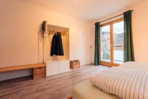 Postel nebo postele na pokoji v ubytování Ferienwohnung Waldgeflüster