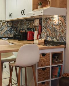 Kuchyň nebo kuchyňský kout v ubytování Azulejo Apartment