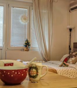 Postel nebo postele na pokoji v ubytování Azulejo Apartment