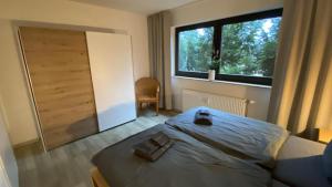 Postel nebo postele na pokoji v ubytování Fewo Taunusblick mit Pool