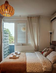 Postel nebo postele na pokoji v ubytování Azulejo Apartment