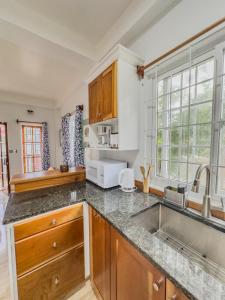 Foto sihtkohas Soufrière asuva majutusasutuse Frenz Mango Suites 3 galeriist