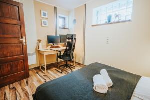 Televízia a/alebo spoločenská miestnosť v ubytovaní VisitZakopane - Janosik Apartment