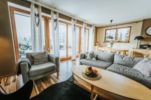 Posedenie v ubytovaní VisitZakopane - Janosik Apartment