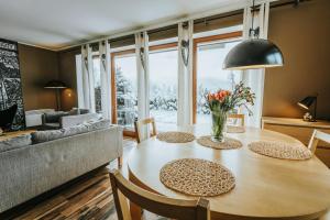Posedenie v ubytovaní VisitZakopane - Janosik Apartment