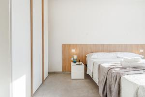 Postel nebo postele na pokoji v ubytování Bellaria Palace - Near the city of Ferrari