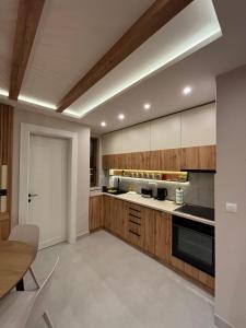 مطبخ أو مطبخ صغير في Šumska staza Divčibare apartmani