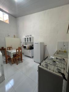 Η κουζίνα ή μικρή κουζίνα στο Casa Mobiliada de temporada