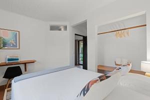 Postel nebo postele na pokoji v ubytování Villas Vibras