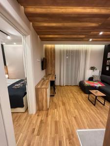 سرير أو أسرّة في غرفة في Šumska staza Divčibare apartmani
