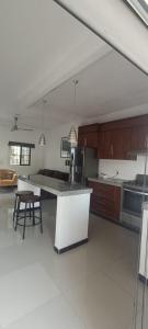 a kitchen with a sink and a counter top at Dep #1 Basilio in Puerto Vallarta