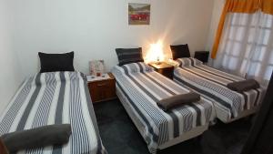 Postel nebo postele na pokoji v ubytování Casa Alquiler temporario garage y patio