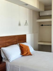Postel nebo postele na pokoji v ubytování Hotel Awazul Bacalar