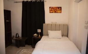 Letto o letti in una camera di Keeper Pyramids View INN
