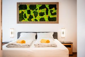 Letto o letti in una camera di BoRa Apartments