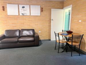 Posezení v ubytování Wards Holiday Flat 3 + 2 fotografie