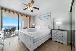 Ένα ή περισσότερα κρεβάτια σε δωμάτιο στο Bluewater 705