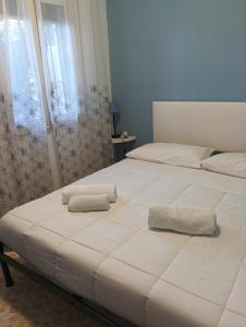 Postel nebo postele na pokoji v ubytování Casa Fronte Mare