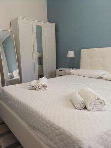Postel nebo postele na pokoji v ubytování Casa Fronte Mare + 24 fotografií