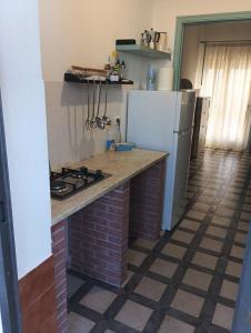 Kuchyň nebo kuchyňský kout v ubytování Casa Fronte Mare