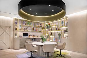 a dining room with a table and chairs at AC Hotel by Marriott Tenerife in Santa Cruz de Tenerife
