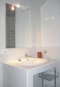 Kúpeľňa v ubytovaní Divi Apartments Valvanera