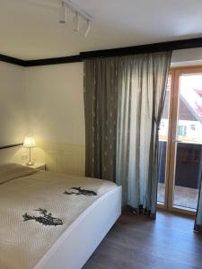 Posteľ alebo postele v izbe v ubytovaní Gastuna Suites